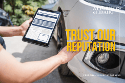 Car insurance form beside damaged vehicle for Idaho car accident claim value review